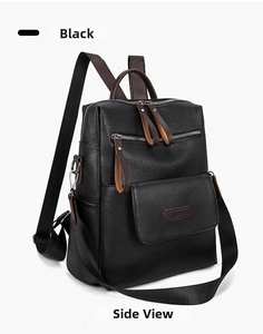 Side view of black lychee grain faux leather backpack with brown accents and fabric strap