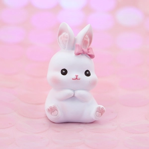 Cute white cartoon rabbit figurine with pink bow tie and heart-shaped paws car decor
