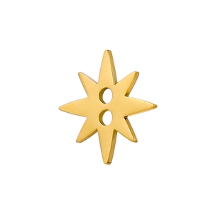 Close-up of golden octagonal star pendant with metallic luster and dual connection holes