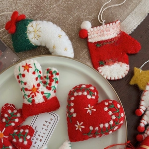 Handmade wool felt Christmas ornaments set with heart and star shapes for tree decoration