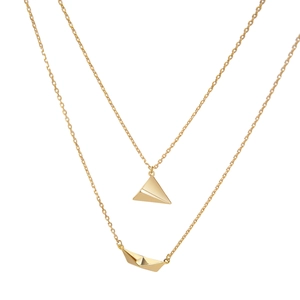 Layered gold necklace featuring origami paper plane and boat pendants on white background