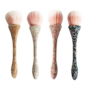 Set of four luxury hourglass makeup brushes with sparkling rhinestones and pink gradient hair
