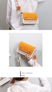 Detail of tricolor leather crossbody bag with wide embroidered snowflake strap and gold hardware