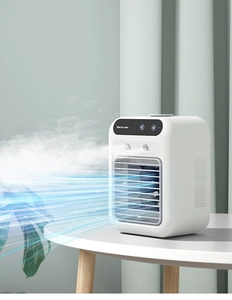 Detail of white mini air cooler with touch control panel and dual mist spray nozzles