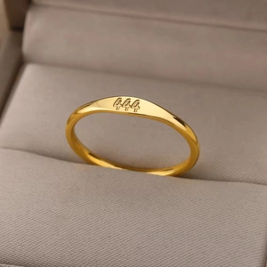 Gold minimalist titanium steel ring featuring 444 angel number engraving in jewelry box