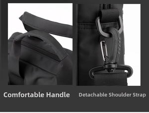 Detail of reinforced handle and detachable shoulder strap hook on black business laptop bag