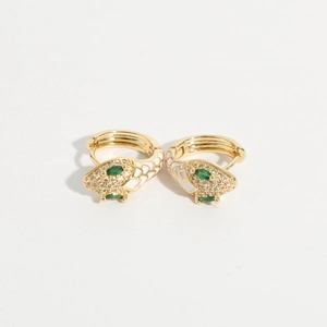 Golden snake hoop earrings with white enamel scales and green gemstone eyes for women
