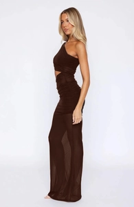 Detail of elegant dark brown one-shoulder dress with ruched fabric and waist cutout
