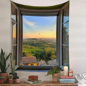 Detail of bohemian faux window tapestry featuring Italian Tuscany landscape on white wall