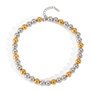 Elegant gold and silver two-tone beaded necklace with polished spheres and adjustable clasp