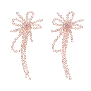 Elegant pink crystal beaded bow earrings with long tassels in a minimalist sweet style