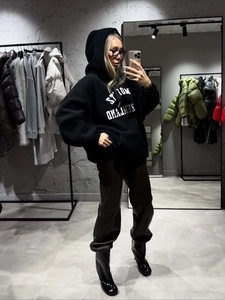 Black fleece hoodie with letter embroidery and brown faux leather joggers outfit