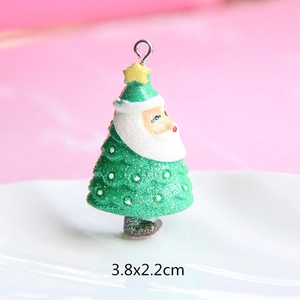 Detail shot of a 3.8x2.2cm resin Santa Claus Christmas tree pendant with gold glitter