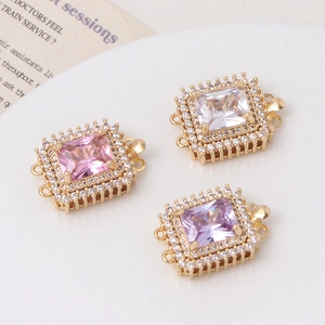 Close-up of square zircon clasps in pink, purple and clear stones for DIY jewelry