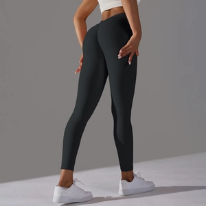 Detail shot of black high-waisted yoga leggings with scrunch butt lifting effect
