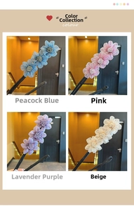 Detail showing four colors of floral hair clips in Peacock Blue, Pink, Purple and Cream