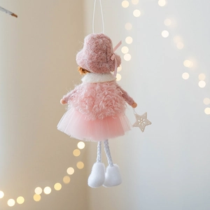 Detailed view of handmade pink plush angel doll ornament with tulle skirt and star charm