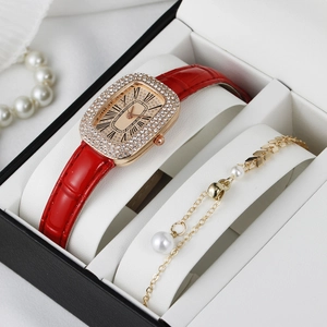 Close-up of luxury women watch set with crystal case and matching pearl bracelet in gift box