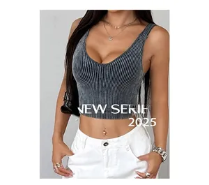 Detail showing charcoal grey ribbed crop top texture and slim fit design on a model