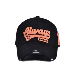 Distressed black cotton baseball cap featuring vintage New York 75 orange embroidery
