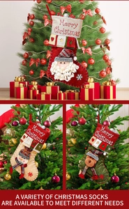 Detail view of 3D Santa, Snowman and Reindeer Christmas stockings with Merry Christmas embroidery