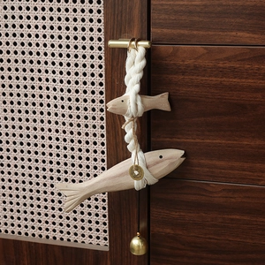 European style wooden carved fish pendant with natural cord and brass bell wall decor