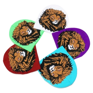 Knit beanie with lion graphic in various colors including white, purple, and green