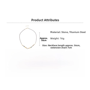Detailed stone and titanium necklace specs showing 56cm length plus 7cm extension