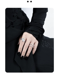 Close-up of S925 silver wave rings with leaf and Z designs featuring white zircons