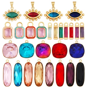 Micro-pave zircon pendants in various shapes and colors with gold-plated copper frames