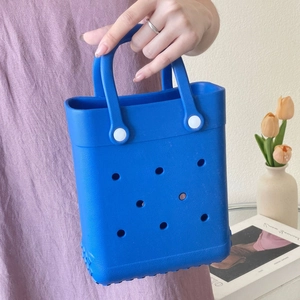 Detailed view of Royal Blue EVA beach tote bag showing cutout design and soft texture