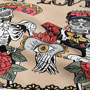 Macro shot of boho skull tapestry fabric showing fine weave and Day of the Dead print