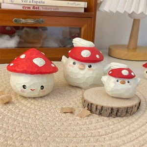 Three-piece set of cute mushroom-capped resin figurines with rustic carved texture detail