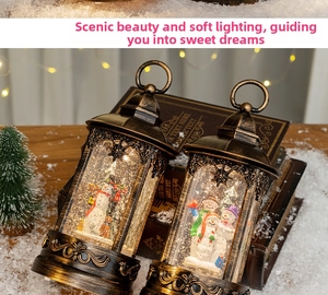 Close-up of vintage bronze Christmas lanterns with snowmen and warm LED lighting