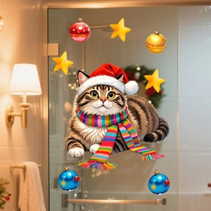 Detailed view of Christmas snowman and cat static window stickers on a glass surface