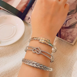 Three-piece set of silver metal bracelets with snake bone and heart pattern for women