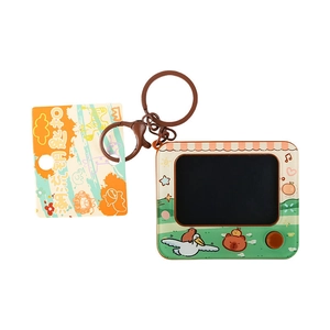 Cartoon capybara graffiti board keychain with mini TV design and metal keyring
