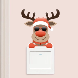 Detailed view of colorful reindeer wall decal with sunglasses above a white light switch