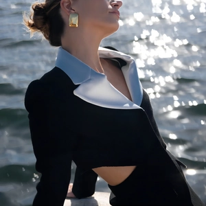 Elegant 18K gold-plated stainless steel geometric earrings worn with a black chic outfit