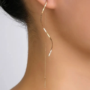 Minimalist gold spiral wave long drop earrings with elegant metal tassel design for women