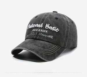 Detailed embroidery on vintage washed denim baseball cap with Rock N Roll text