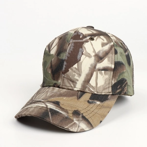 Detailed view of durable cotton camouflage baseball cap with curved brim and stitching
