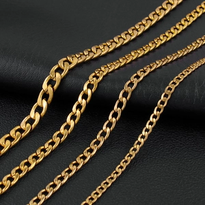 Set of minimalist golden stainless steel Cuban necklaces in four different widths on leather