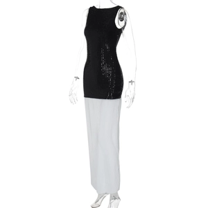 Close-up detail of sequined bodice and pleated long skirt stitching on a black dress