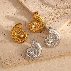 French vintage style 18k gold conch pearl earrings for women with spiral shell texture