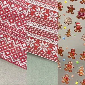 3D embossed Christmas nail stickers featuring red knit patterns and gingerbread man designs