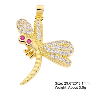 Golden dragonfly pendant with clear zircon wings and pink gemstone eyes detail