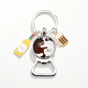 Silver bottle opener keychain with cat tai chi gem and beer bottle charm in white background