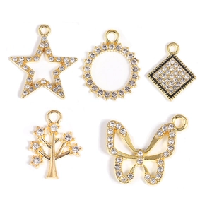 Golden alloy pendants with sparkling rhinestones in star, butterfly, and tree designs