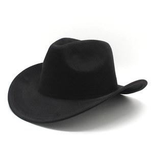 Macro side view of black suede western cowboy hat with curved brim and dimpled crown
